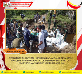TIM SATGAS GULBENCAL KODIM 0304/AGAM BANGUN TANGGUL DAN JEMBATAN DARURAT UNTUK MEMPERCEPAT BANTUAN DI JORONG MASANG DAN JORONG LABUHAN