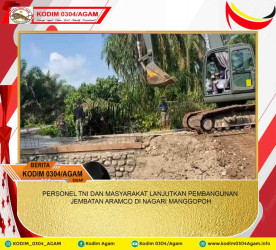 PERSONEL TNI DAN MASYARAKAT LANJUTKAN PEMBANGUNAN JEMBATAN ARAMCO DI NAGARI MANGGOPOH